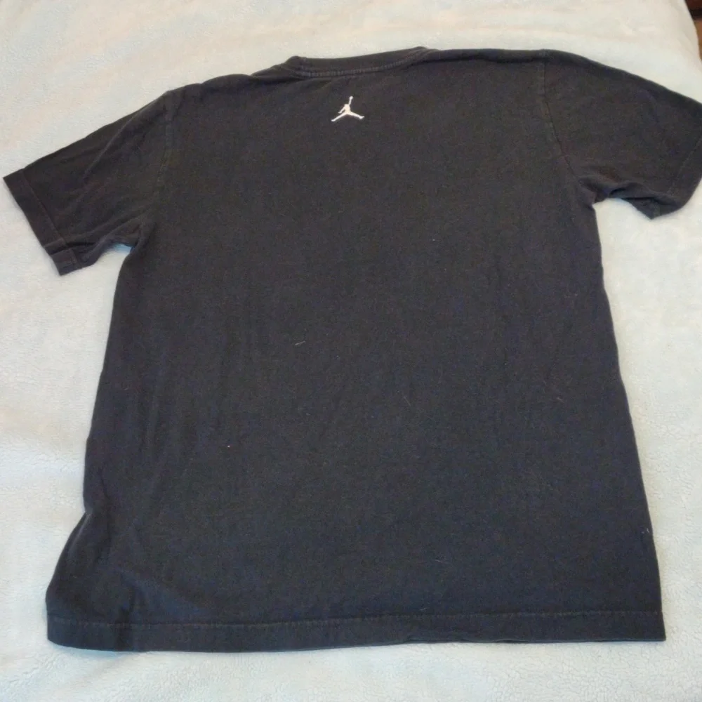 Jordan shirt with Chicago displayed in the middle